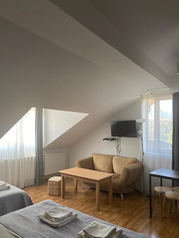 Postel nebo postele na pokoji v ubytování Hotel Cité