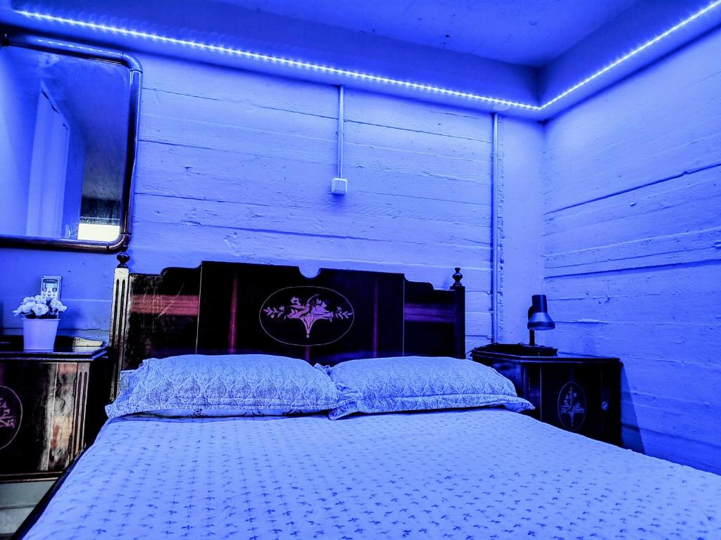 Letto o letti in una camera di HOME LOW Ceiling Verga Sea View