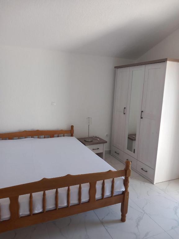 Posteľ alebo postele v izbe v ubytovaní Apartments Radica