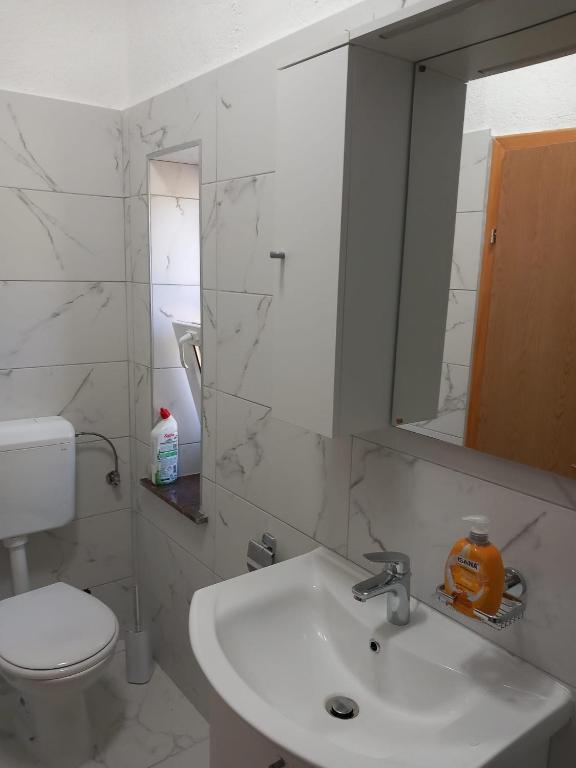 Kúpeľňa v ubytovaní Apartments Radica