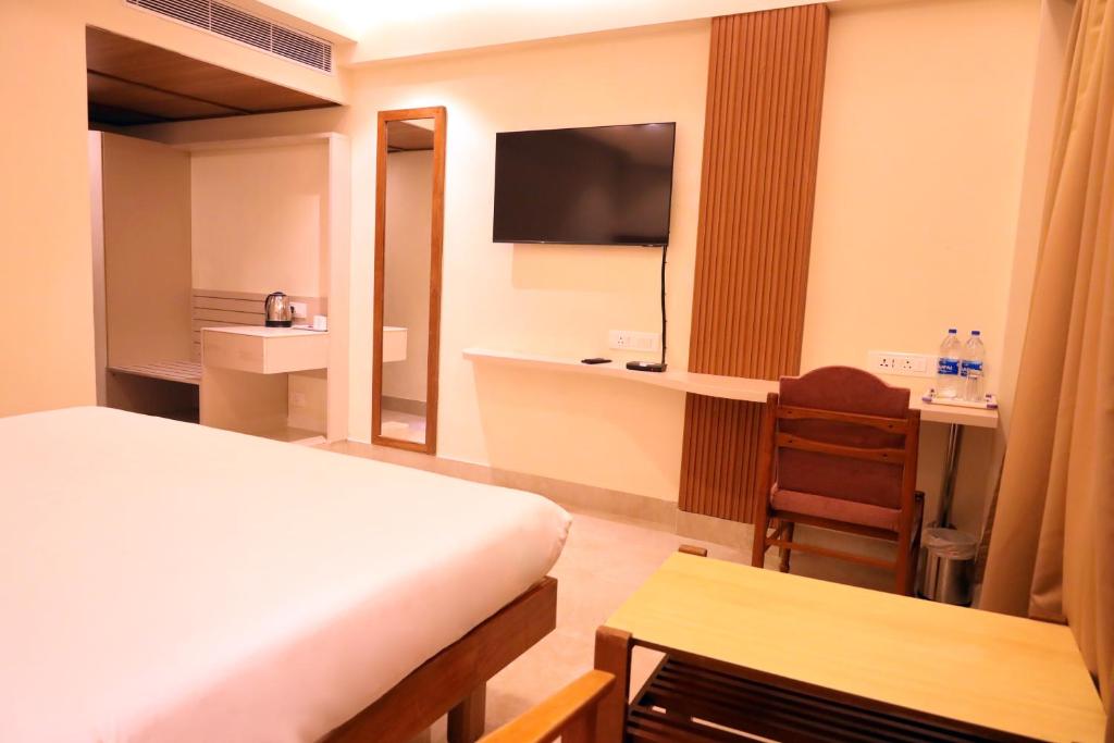 TV a/nebo společenská místnost v ubytování Hotel Surguru