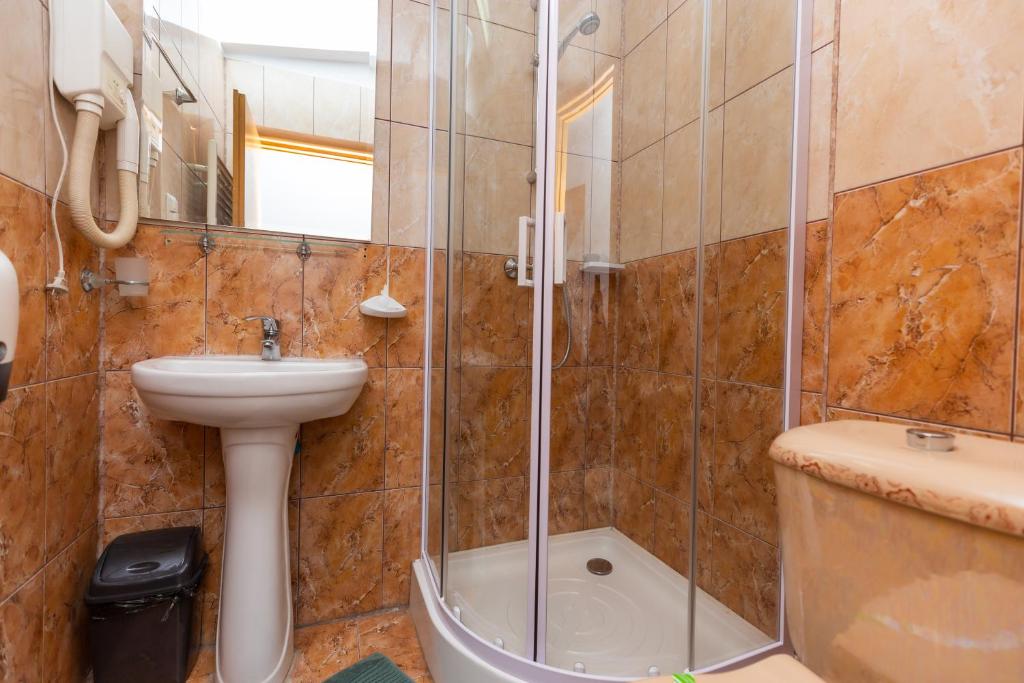 Koupelna v ubytování Hotel Sir Colentina