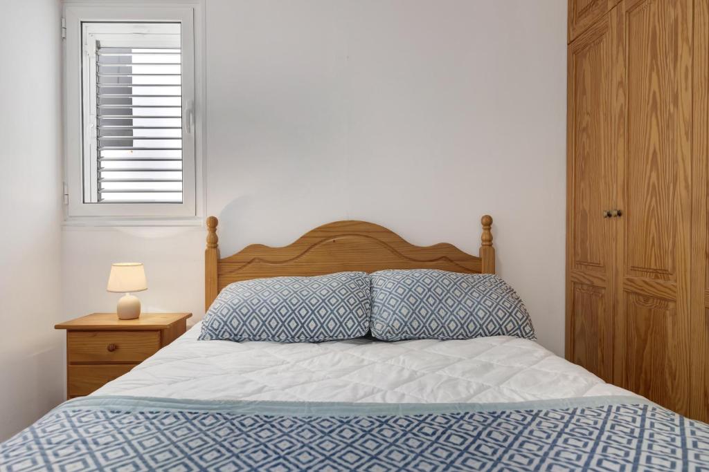 A bed or beds in a room at Casa Carmencita