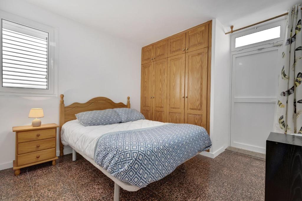 A bed or beds in a room at Casa Carmencita