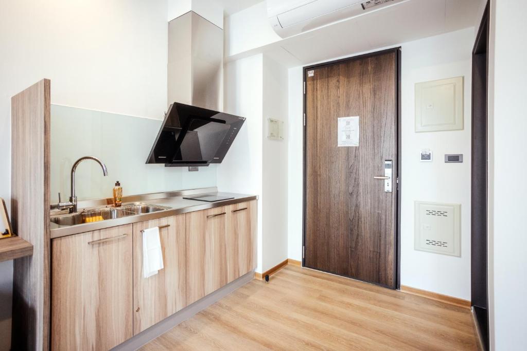 Kuchyň nebo kuchyňský kout v ubytování kaori B&B