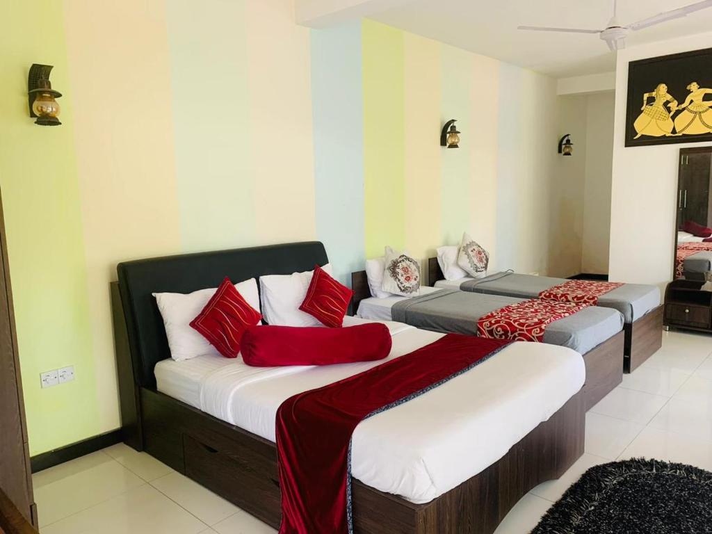 Postel nebo postele na pokoji v ubytování Sohili 3R Resort Ella