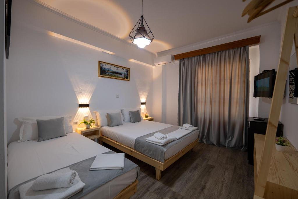 Letto o letti in una camera di Apart Hotel Alex