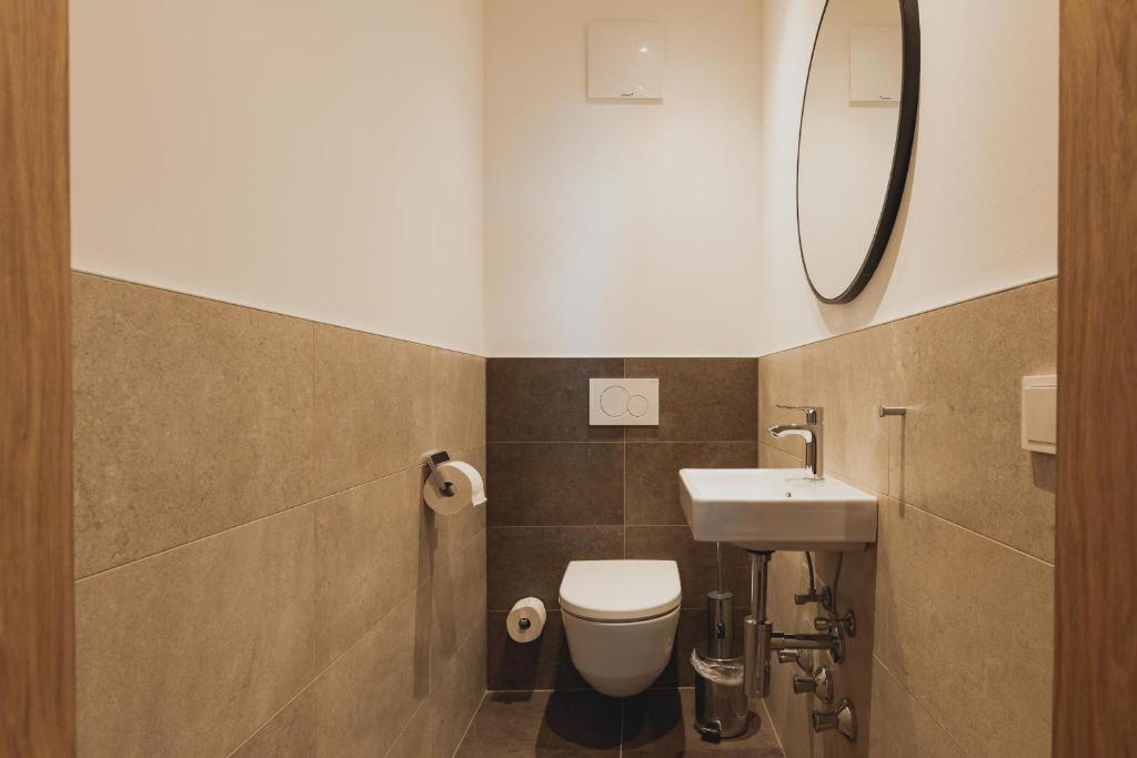 Koupelna v ubytování Portis Appartements