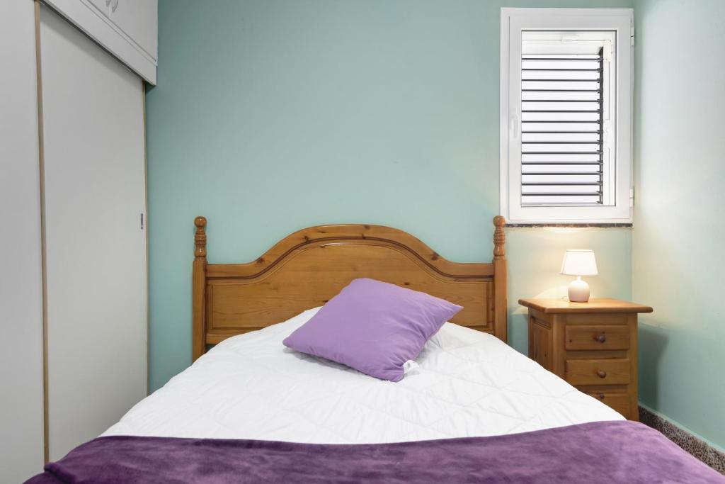 A bed or beds in a room at Casa Carmencita