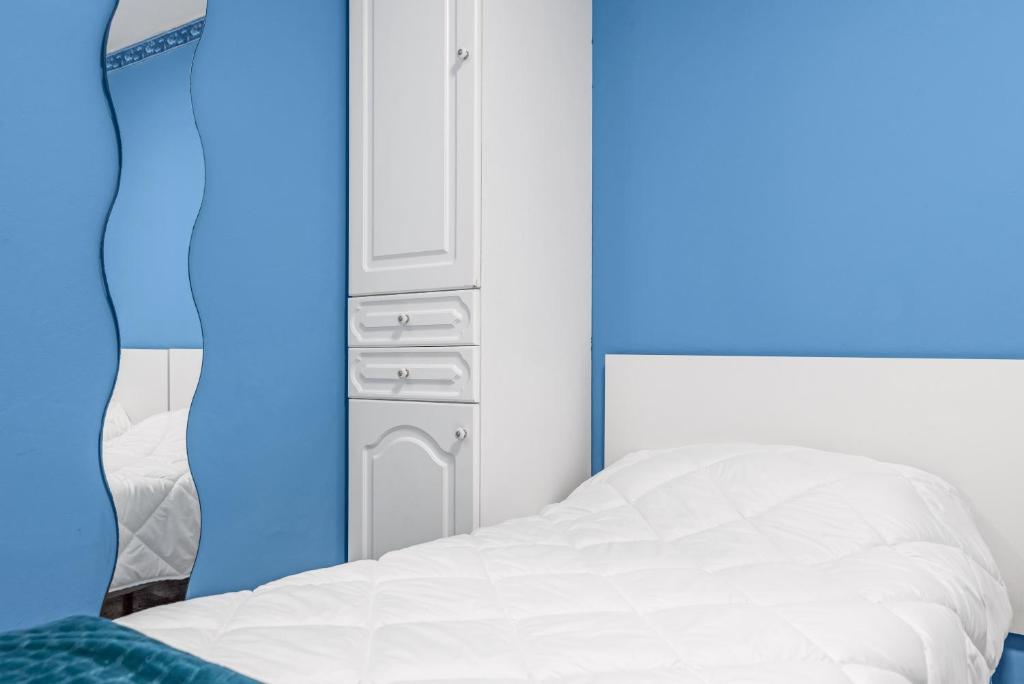 A bed or beds in a room at Casa Carmencita