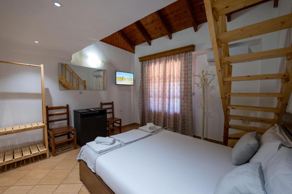 Letto o letti in una camera di Apart Hotel Alex