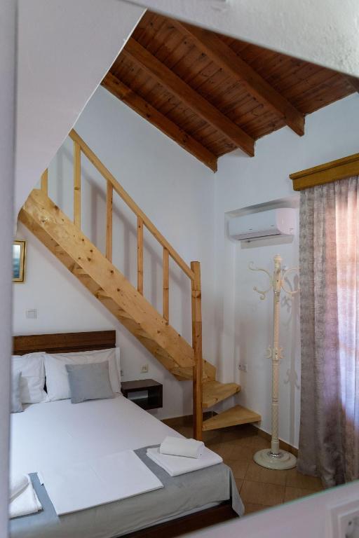 Letto o letti in una camera di Apart Hotel Alex