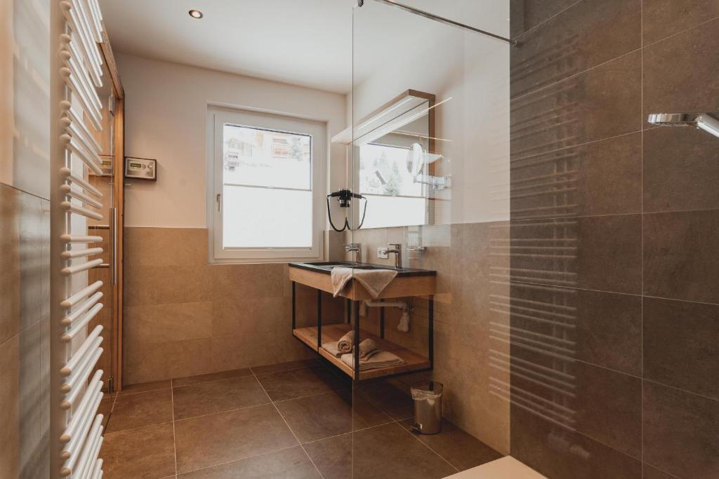Koupelna v ubytování Portis Appartements