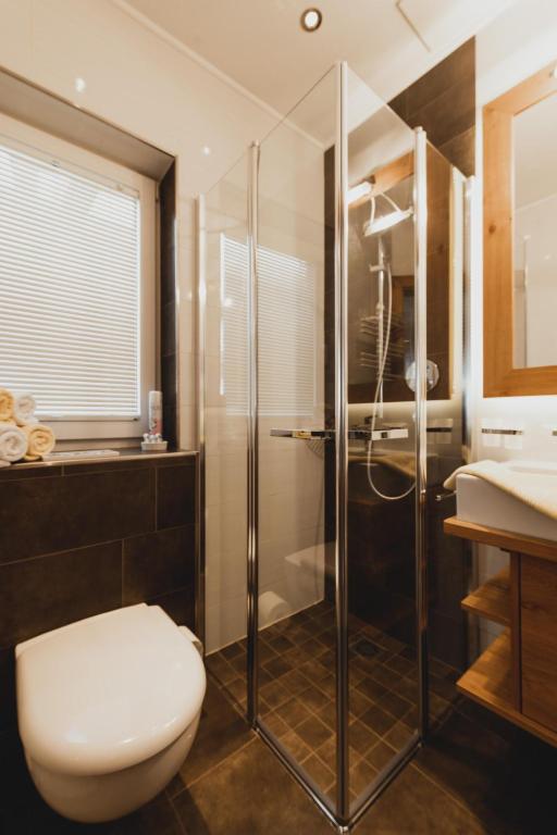 Koupelna v ubytování Portis Appartements