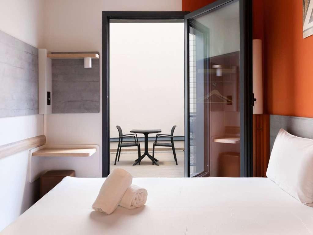 Cama o camas de una habitación en Ibis Budget Madrid Centro Lavapies