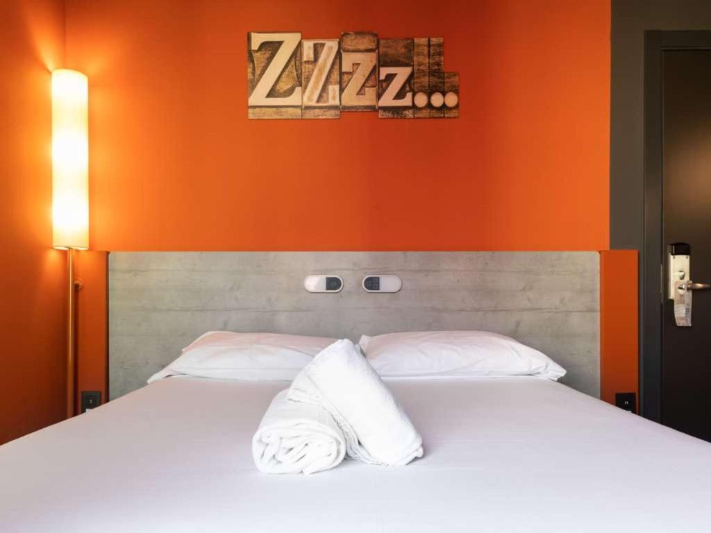 Cama o camas de una habitación en Ibis Budget Madrid Centro Lavapies