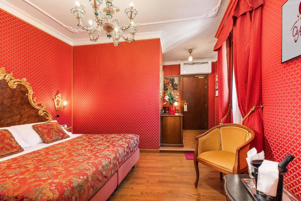 Postel nebo postele na pokoji v ubytování Hotel Ca' Alvise