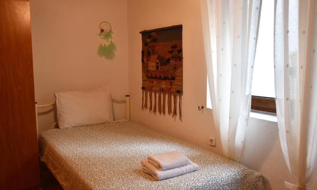 Postel nebo postele na pokoji v ubytování Kactro House