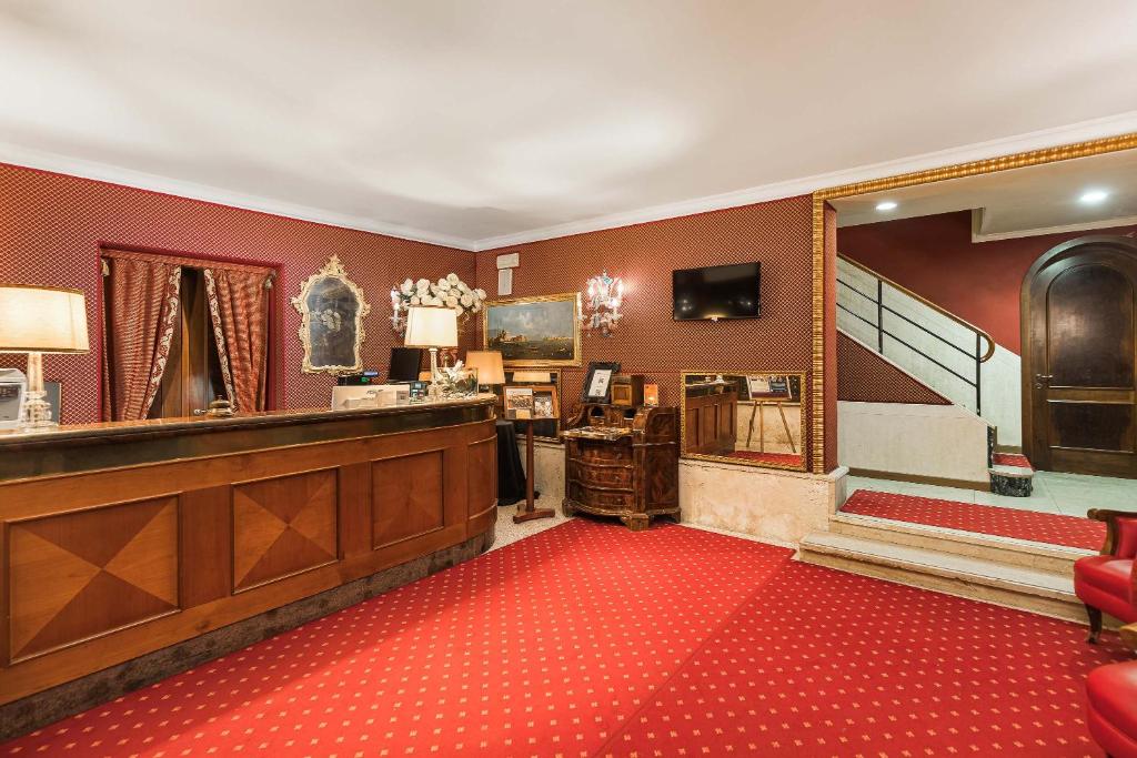 TV a/nebo společenská místnost v ubytování Hotel Ca' Alvise