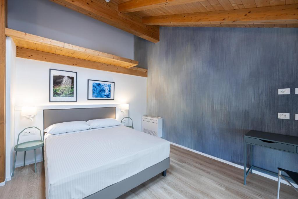Postel nebo postele na pokoji v ubytování Agriturismo Sadira