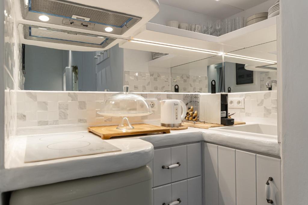 Kuchyň nebo kuchyňský kout v ubytování Santa Katerina Apartments & Studios