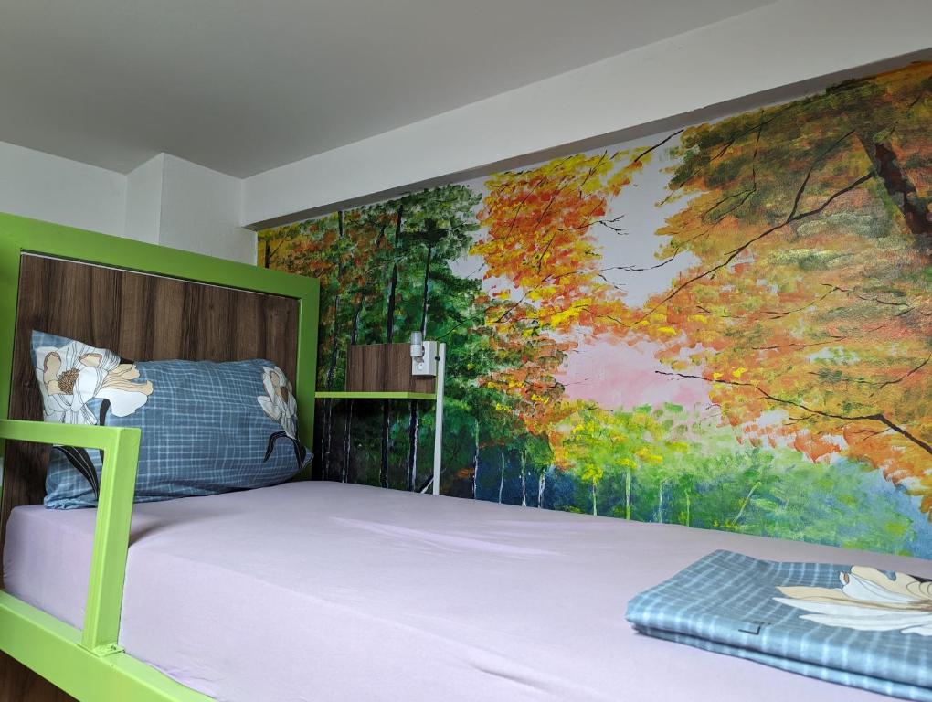 Ein Bett oder Betten in einem Zimmer der Unterkunft Tias Hostel