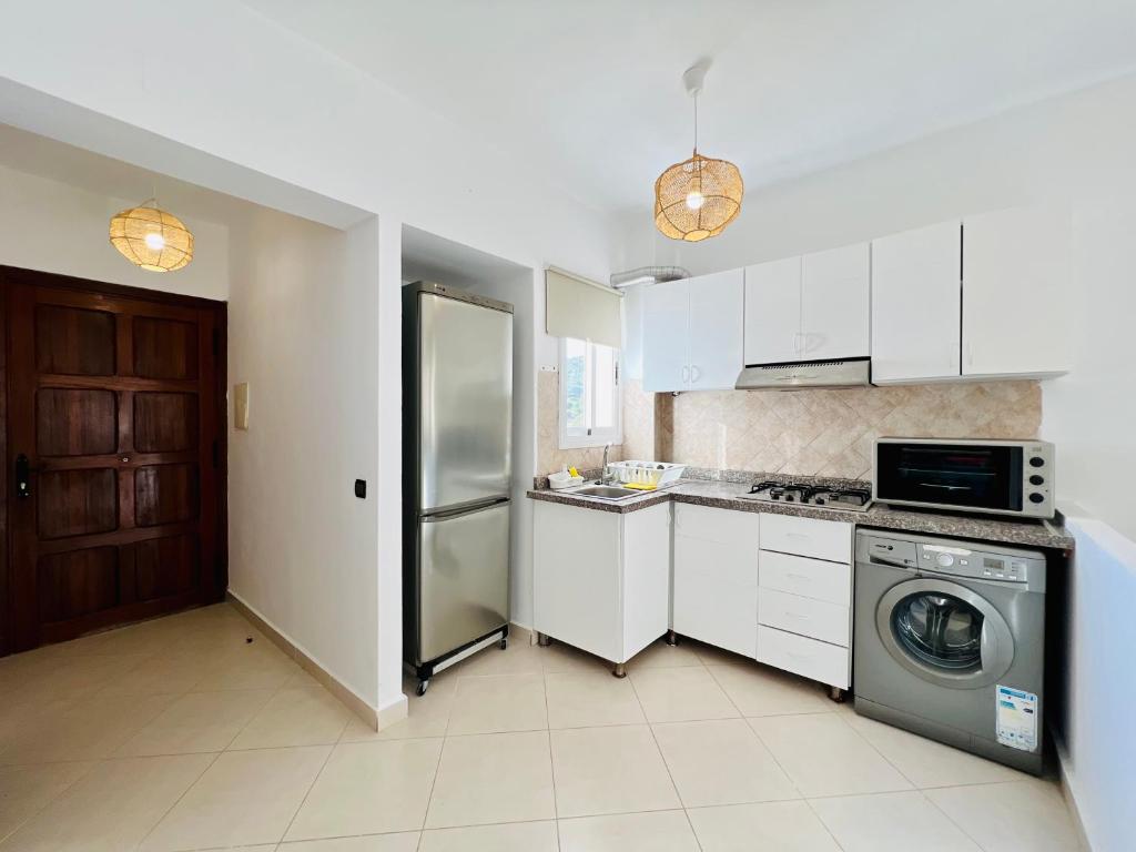 Kuchyň nebo kuchyňský kout v ubytování Appartement Cabo Oasis
