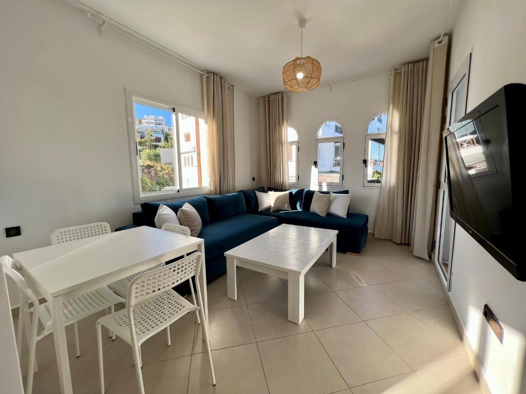 TV a/nebo společenská místnost v ubytování Appartement Cabo Oasis