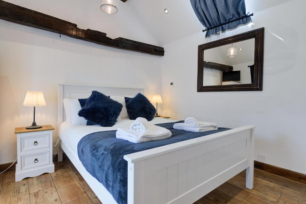 Ένα ή περισσότερα κρεβάτια σε δωμάτιο στο Stylish Getaway - Free Parking, Short Drive to Stamford