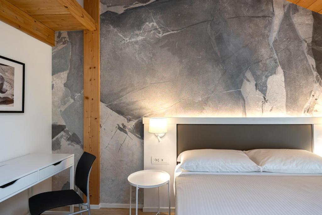 Postel nebo postele na pokoji v ubytování Agriturismo Sadira