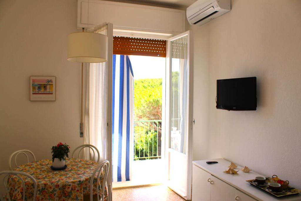 TV a/nebo společenská místnost v ubytování Residence delle Nazioni