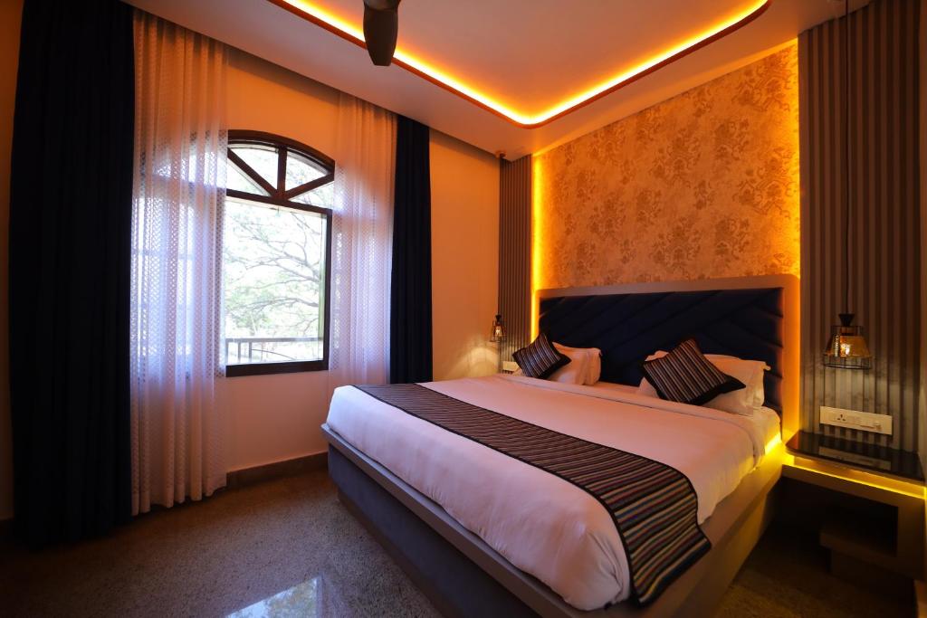 Postel nebo postele na pokoji v ubytování Aman Homestay, A Boutique Hotel