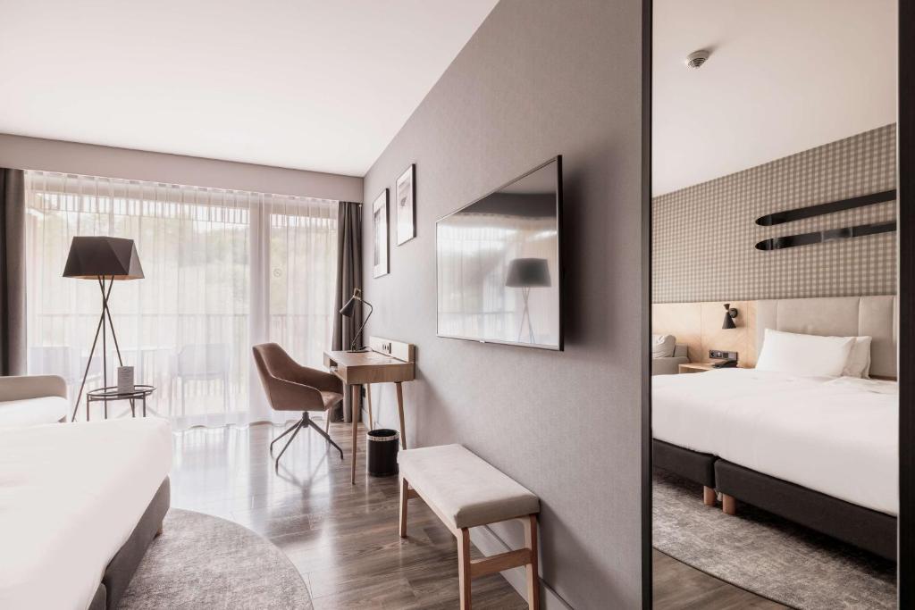 Postel nebo postele na pokoji v ubytování Radisson Hotel Szklarska Poręba