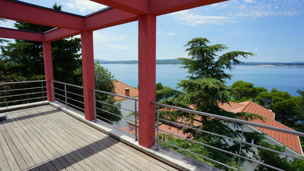 a balcony with a view of the water at Villa Panthera in Dramalj