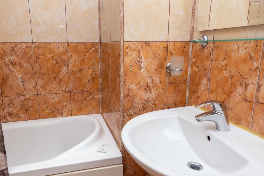 Koupelna v ubytování Hotel Sir Colentina