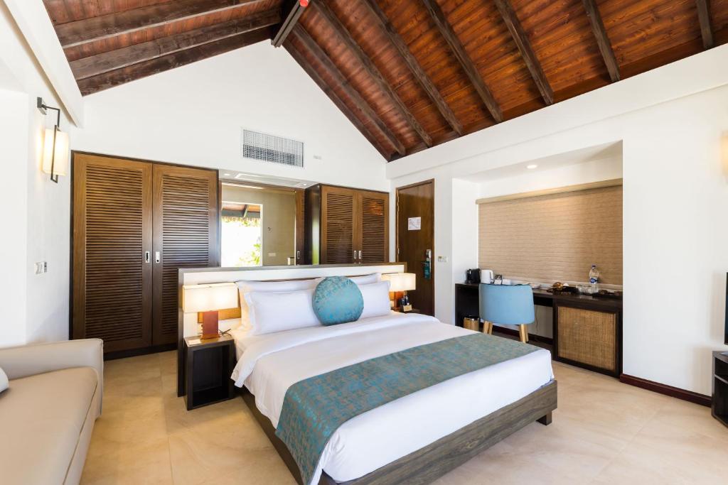 Postel nebo postele na pokoji v ubytování NOOE Maldives Kunaavashi - Stay 5 nights or more and get Free Speed Boat Transfers - And the Offer valid till 25th August 2025 and Stay Period till 30th September