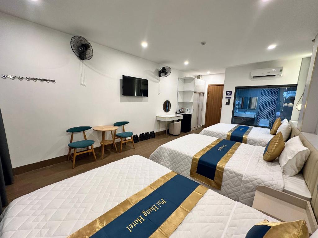 Postel nebo postele na pokoji v ubytování Hotel Phi Hùng