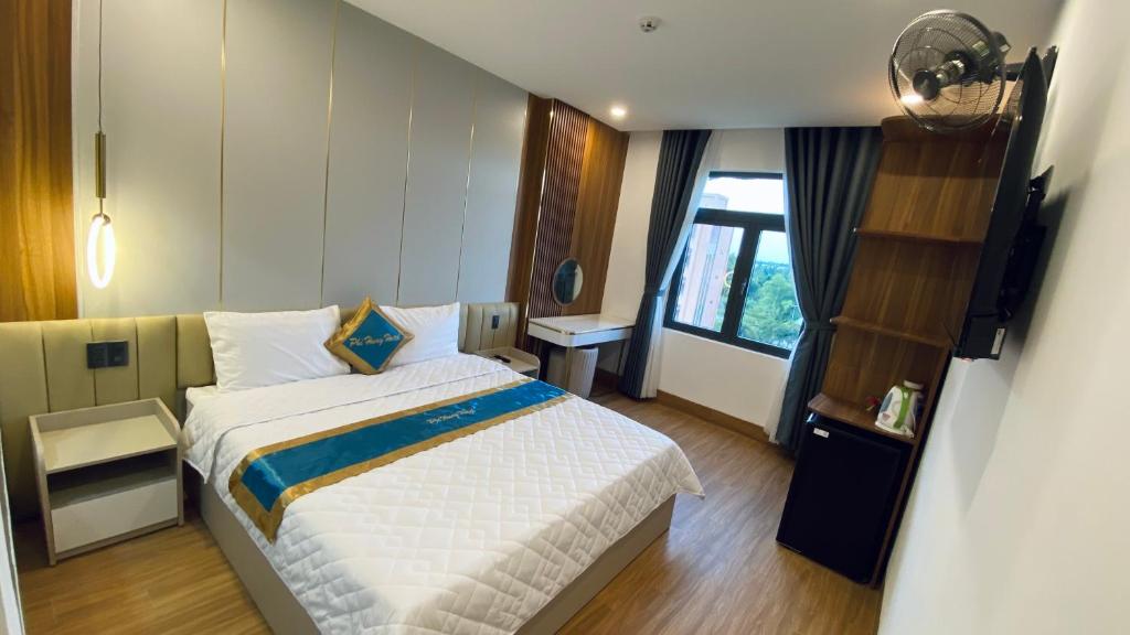 Postel nebo postele na pokoji v ubytování Hotel Phi Hùng