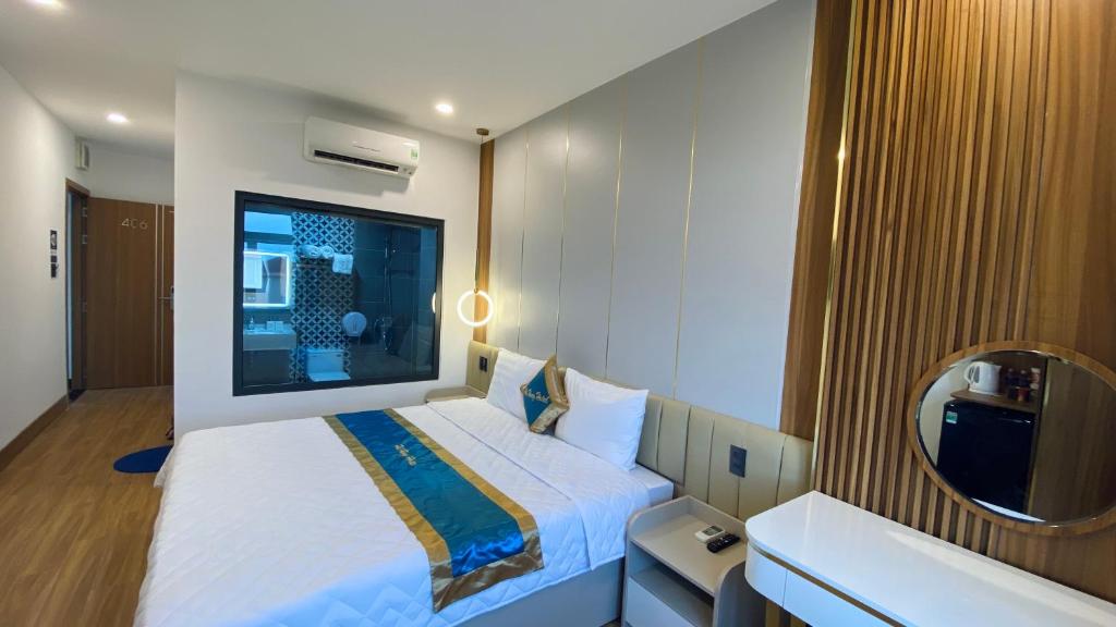Postel nebo postele na pokoji v ubytování Hotel Phi Hùng