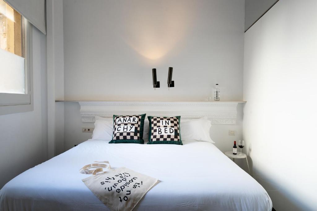 Posteľ alebo postele v izbe v ubytovaní Chic & Basic Born Boutique Hotel
