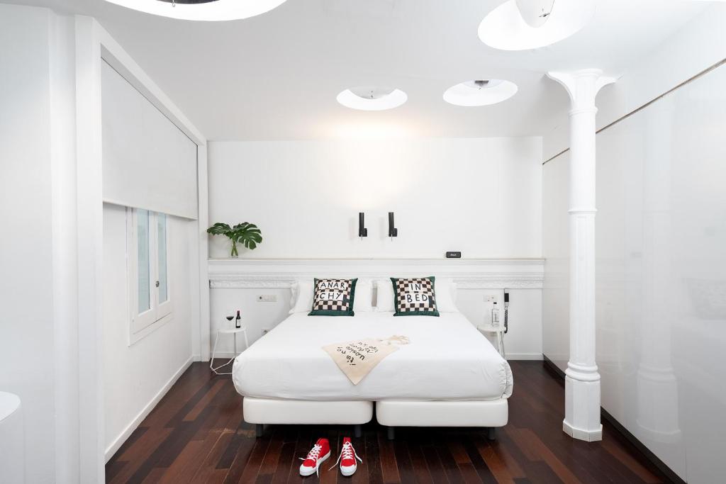 Posteľ alebo postele v izbe v ubytovaní Chic & Basic Born Boutique Hotel