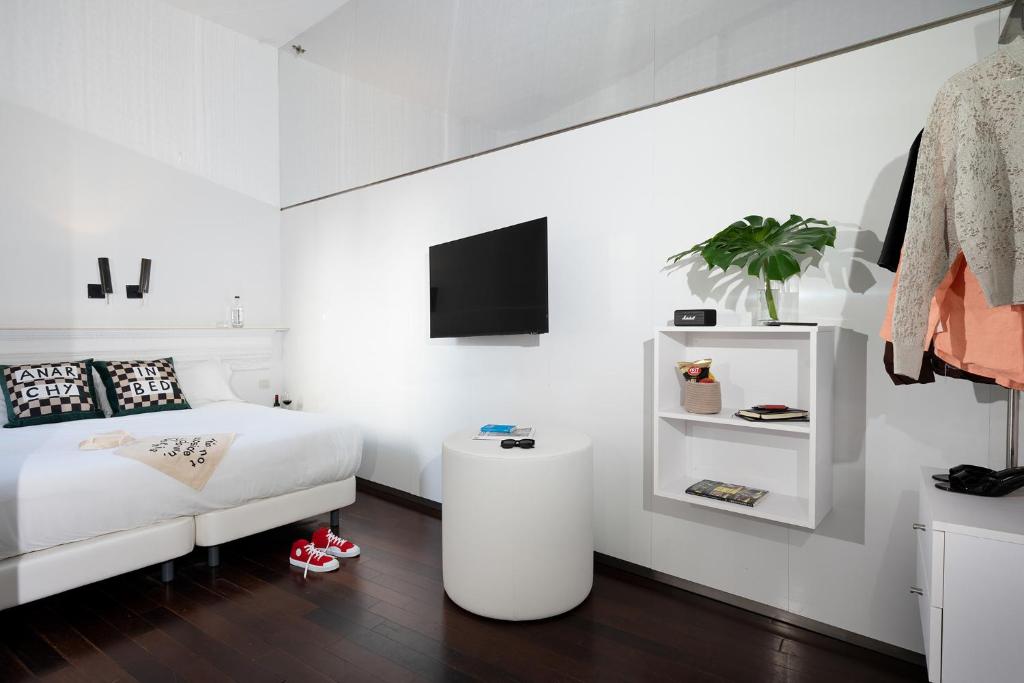 Posteľ alebo postele v izbe v ubytovaní Chic & Basic Born Boutique Hotel