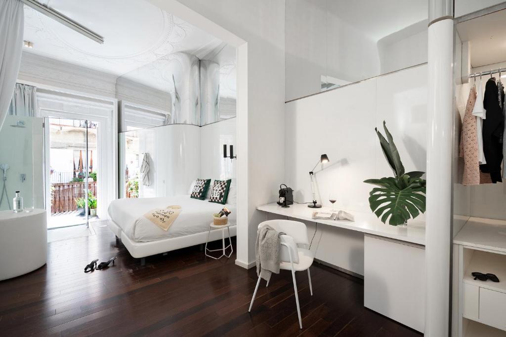 Posteľ alebo postele v izbe v ubytovaní Chic & Basic Born Boutique Hotel
