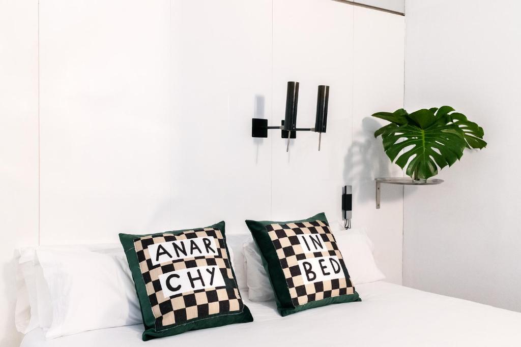 Posteľ alebo postele v izbe v ubytovaní Chic & Basic Born Boutique Hotel