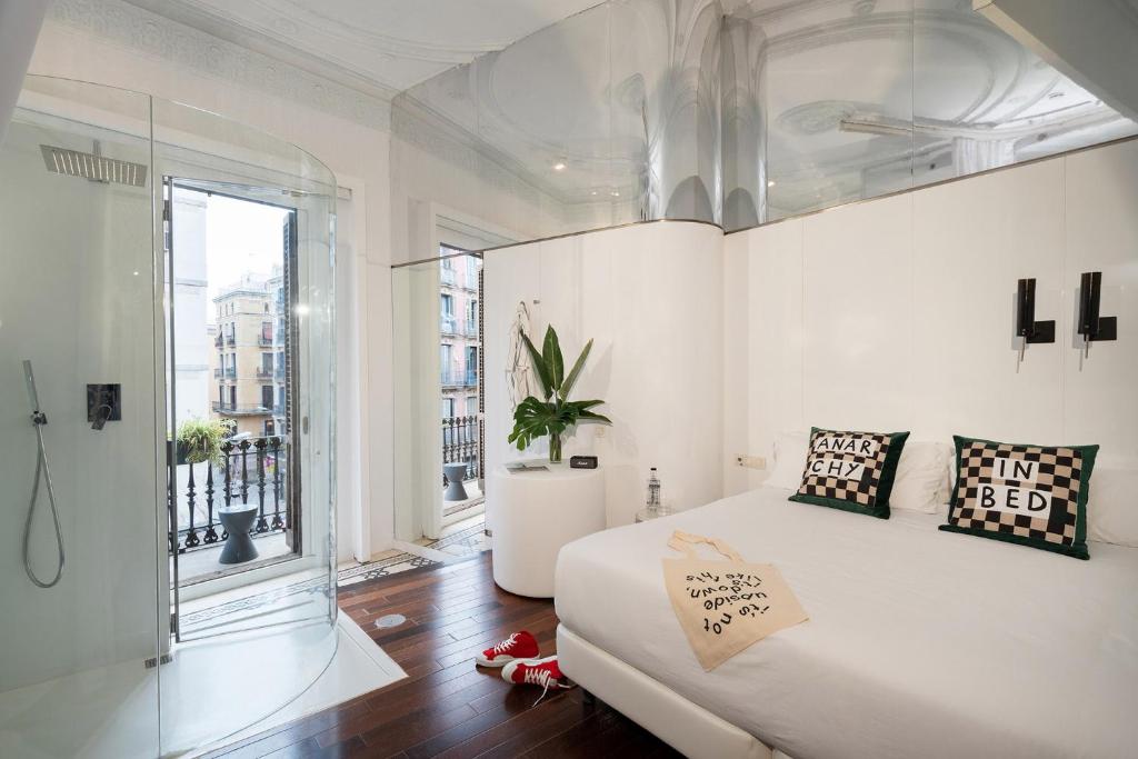 Posteľ alebo postele v izbe v ubytovaní Chic & Basic Born Boutique Hotel