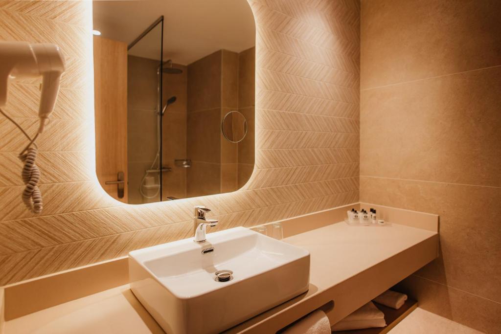 Koupelna v ubytování Hotel Miramar