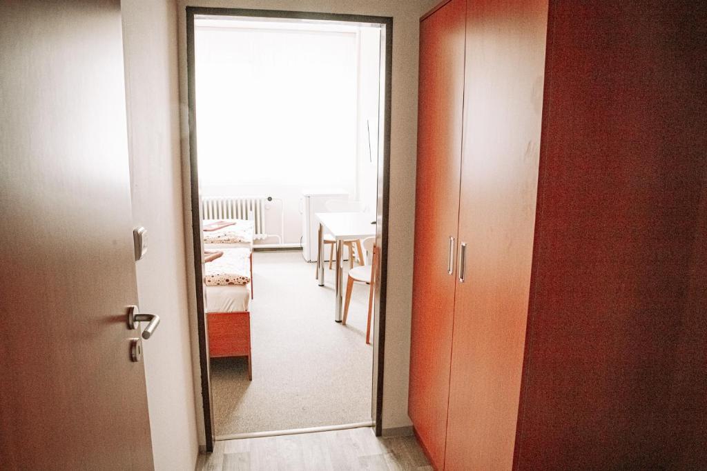 Postel nebo postele na pokoji v ubytování Penzion Centra Zdraví
