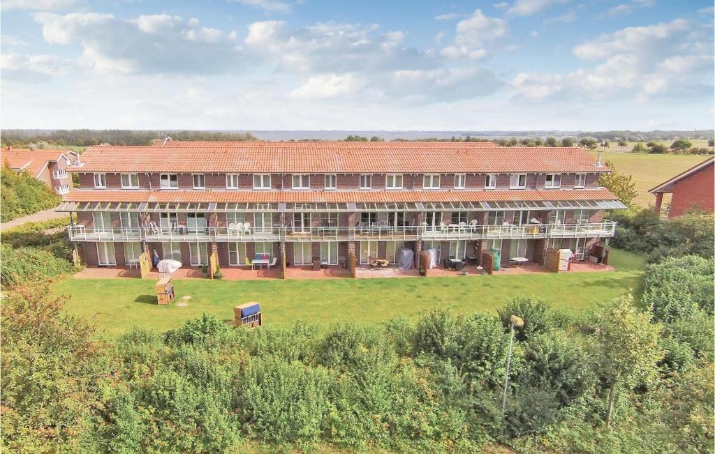 an aerial view of a large building in a field at Apt 3 Hohen Wieschendorf in Hohen Wieschendorf