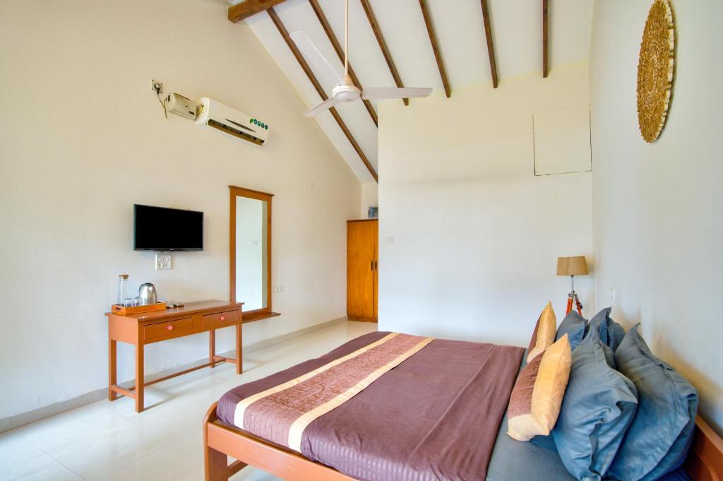 Фотография из галереи Papilio Beach Front Cottages-TBV в Баге