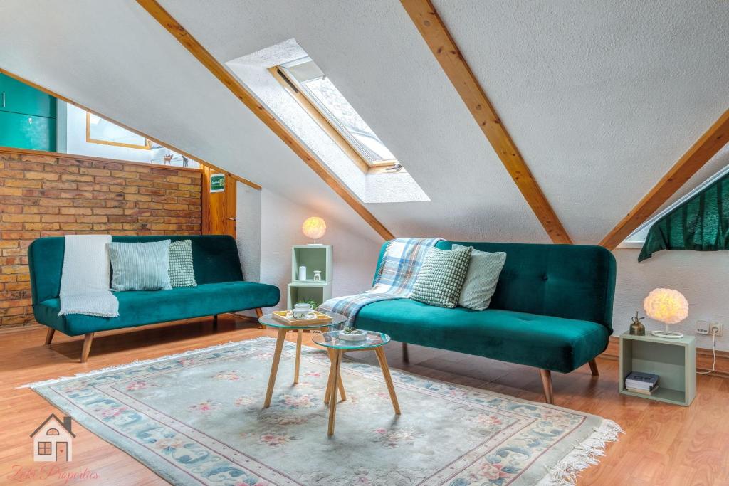 Posezení v ubytování ACME Apartments